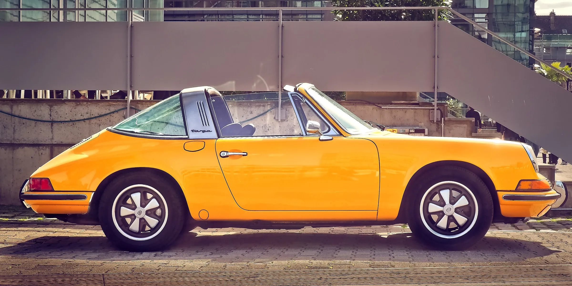 Vintage orange Porsche 911 Targa — the European craft Don built his career on